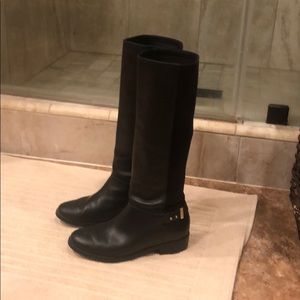 Cole Haan black leather and suede riding boots.